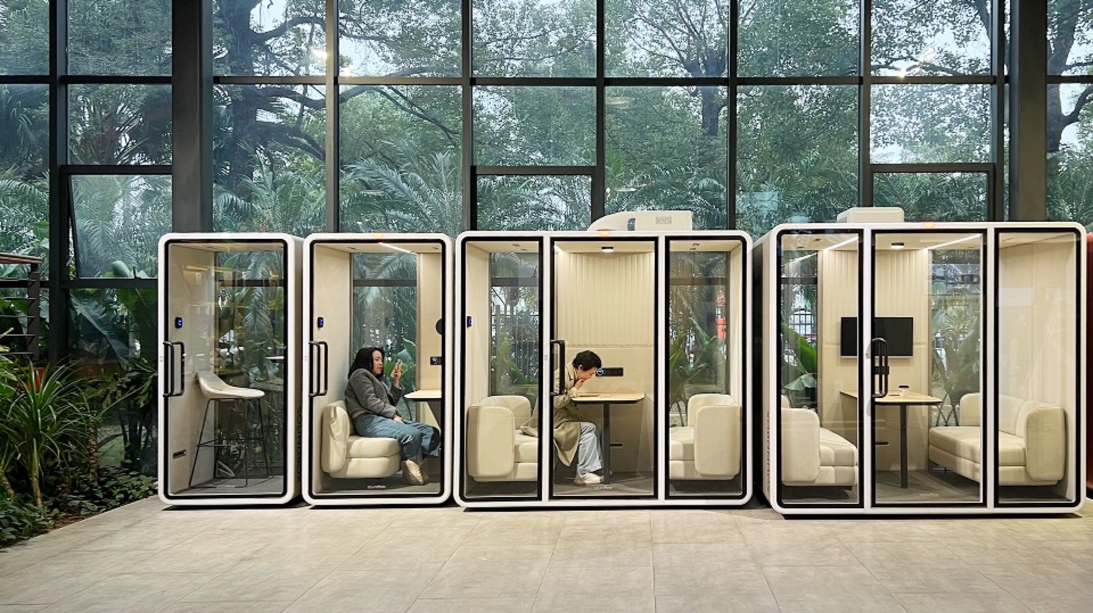 ZOUND VOGUE flagship pod in a dark furniture-grade finish